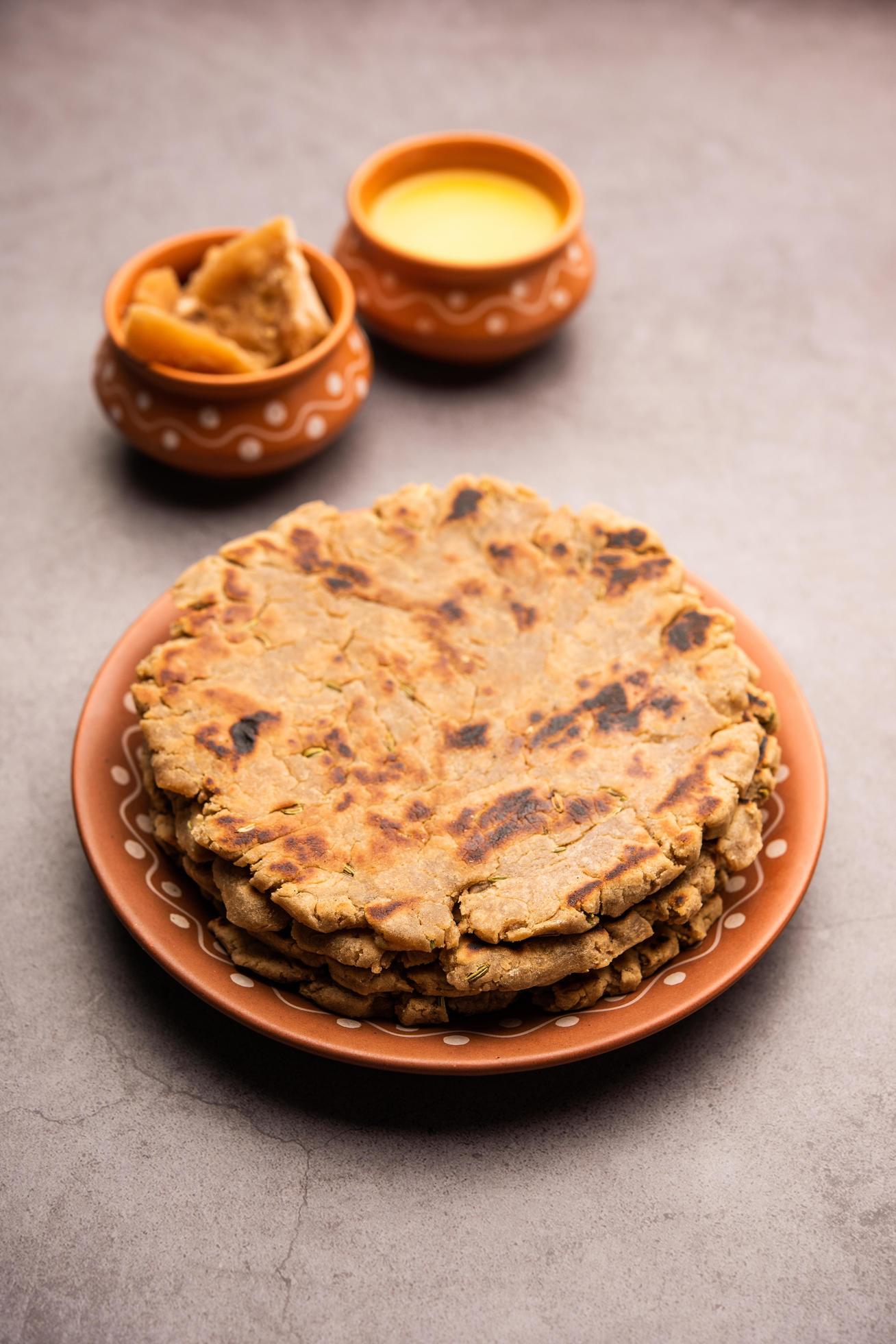 Sweet roti made out of rice flour, jaggery, and ghee. Gud ki roti. gur ki roti, jaggery Bhakri, meethi gud ki roti. Winter food. Copy space. Stock Free