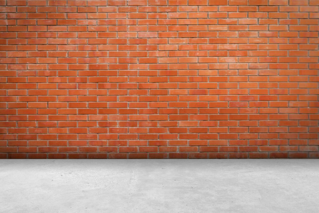 Brick wall room and floor background and texture with copy space. Stock Free