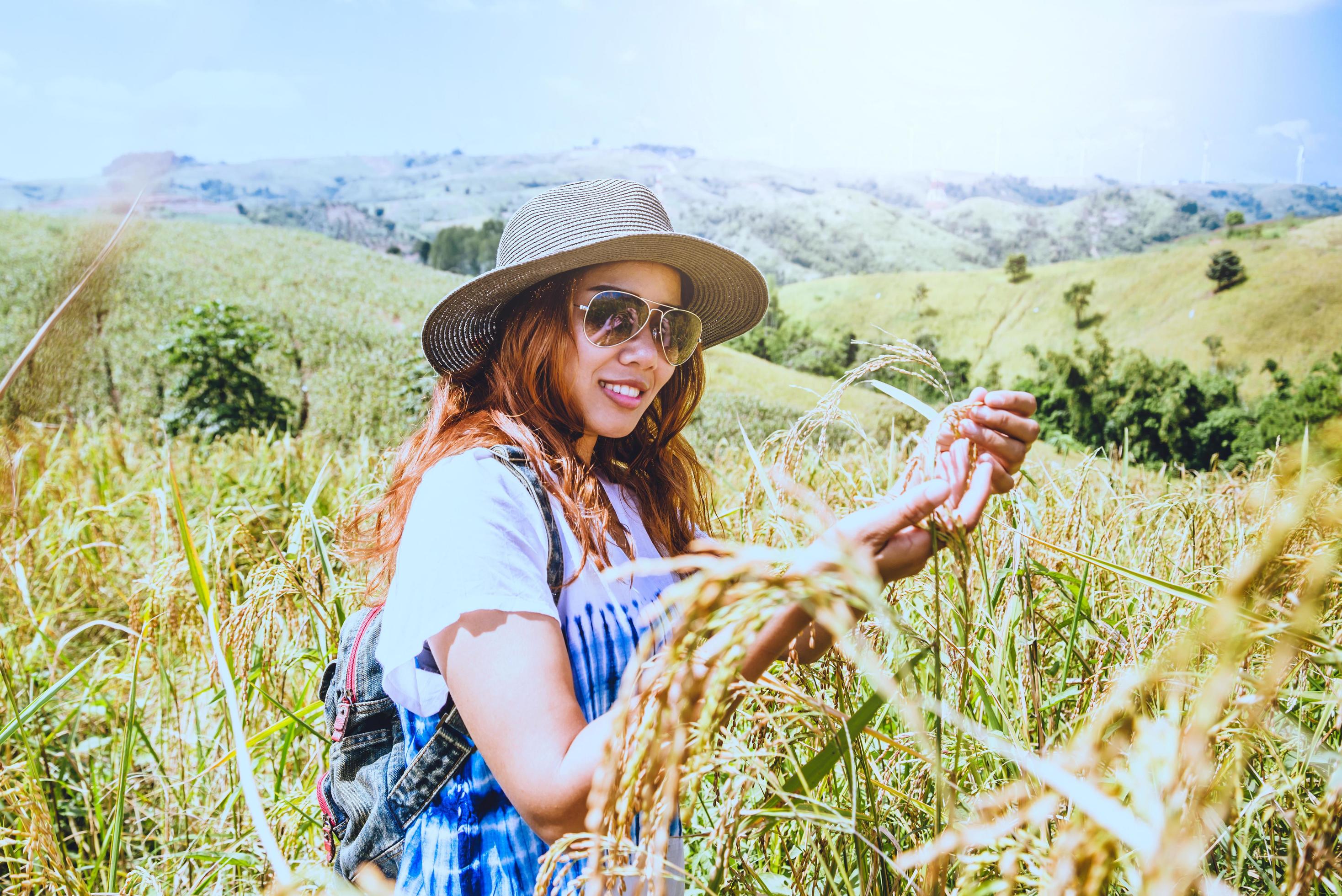 Asian women travel relax in the holiday. Stand natural touch mountain field. Thailand Stock Free