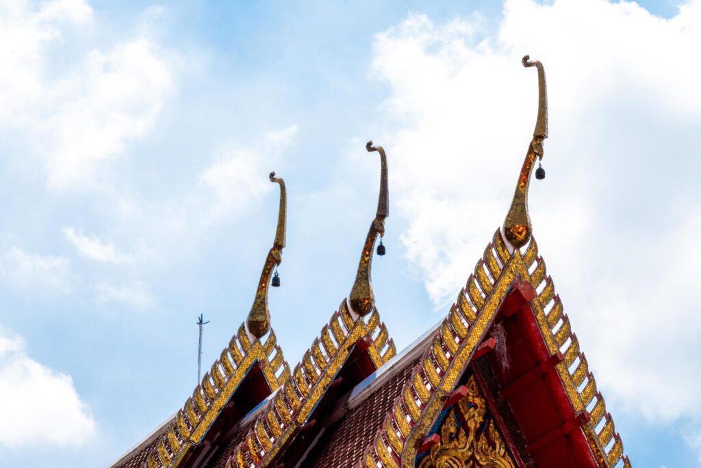 Temple roof. Architectural detail on roof of Thai temple. Beautiful architecture in Ancient buddhist temple Stock Free