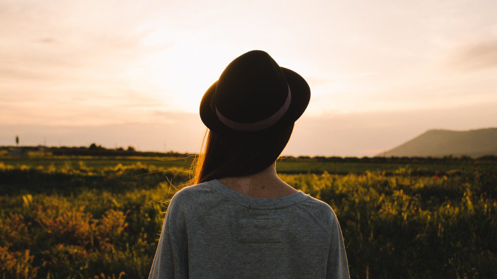 Free Stock Photo of a woman with a hat watching the sunset –