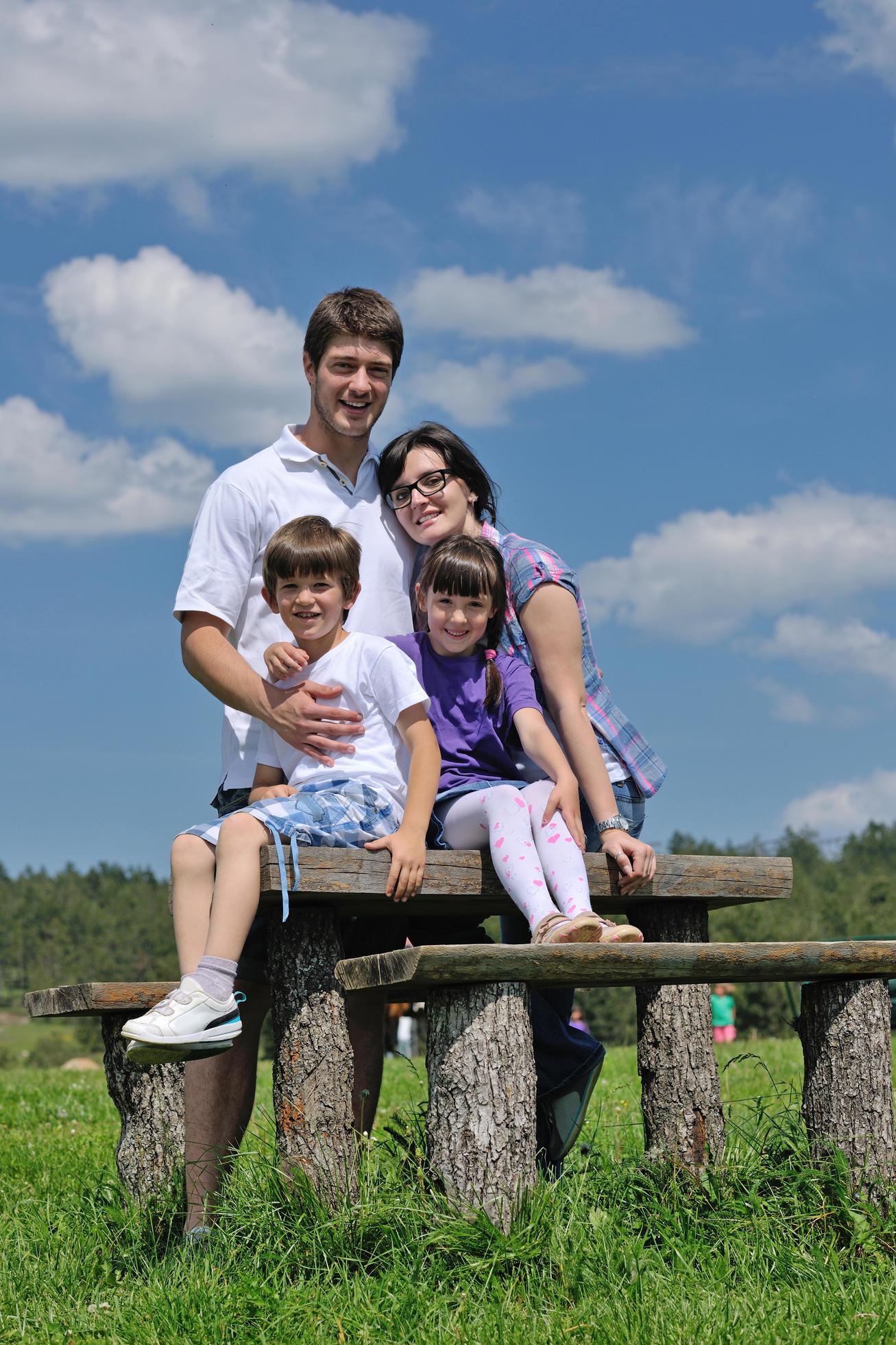 happy young family have fun outdoors Stock Free