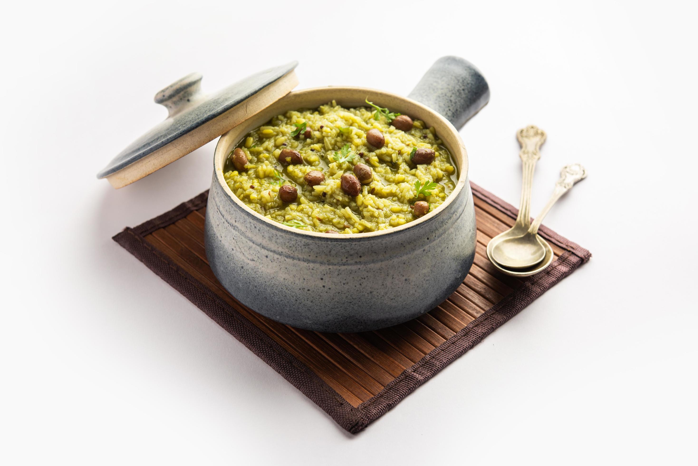 Palak khichdi is a one pot nutritious meal of mung lentils and rice with spinach, Indian food Stock Free