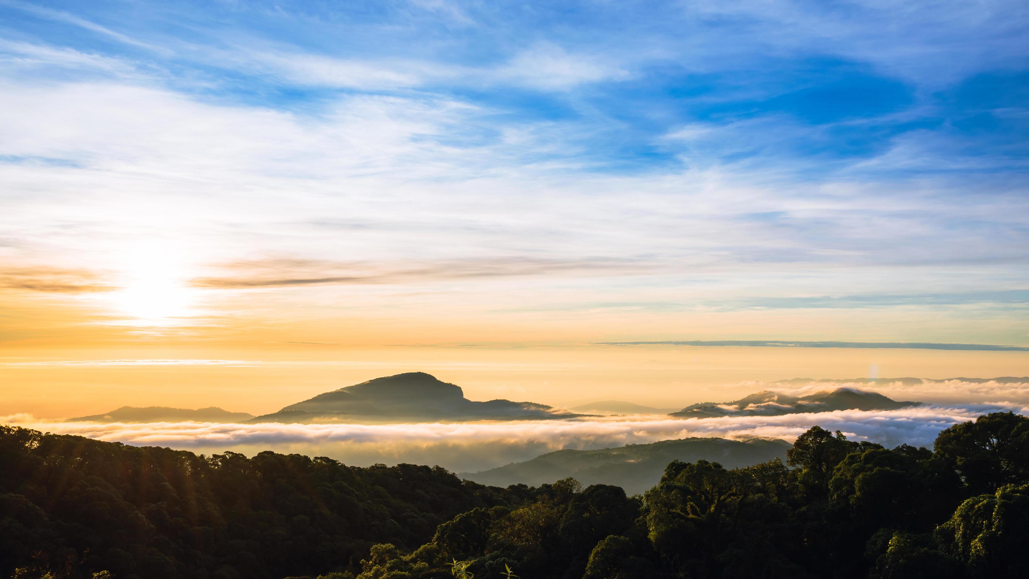 The background of nature with fog on the mountain. In the rainy weather in the countryside. winter Stock Free