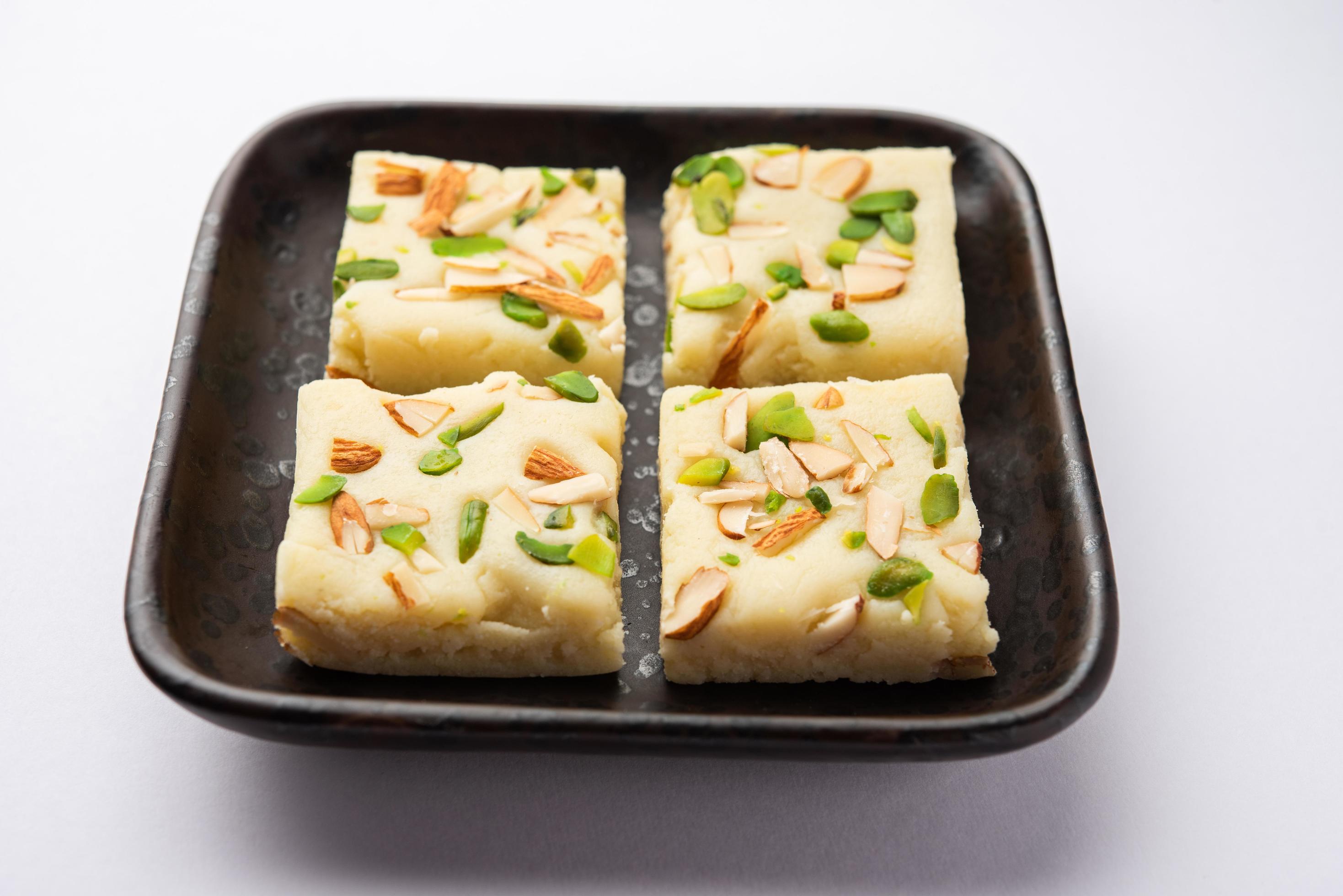 Milk powder barfi also known as Mava burfi, white Khoya burfi or Barfee, Indian Sweet food Stock Free