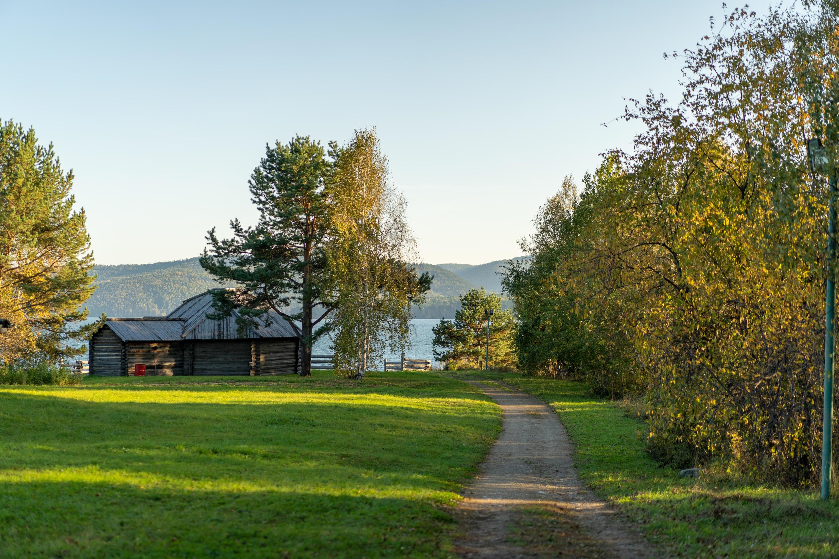 Natural landscape with wooden buildings. Stock Free