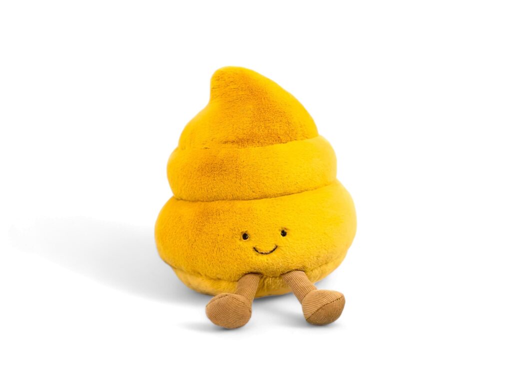 Poop doll on white background Stock Free