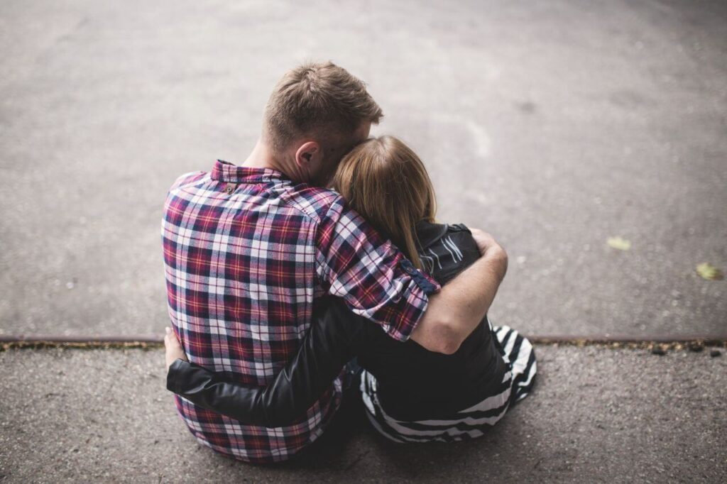 Young Couple Cuddling Stock Free