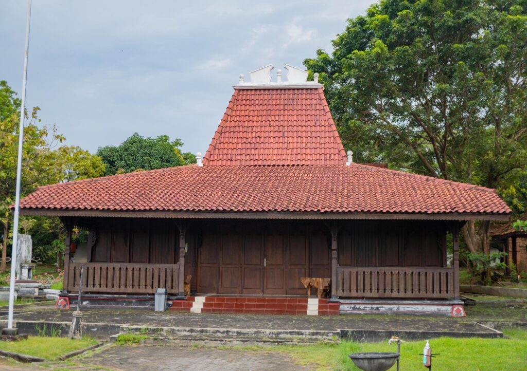 Traditional house of Central Java with nature and blue sky. The photo is suitable to use for traditional design house of Java people. Stock Free