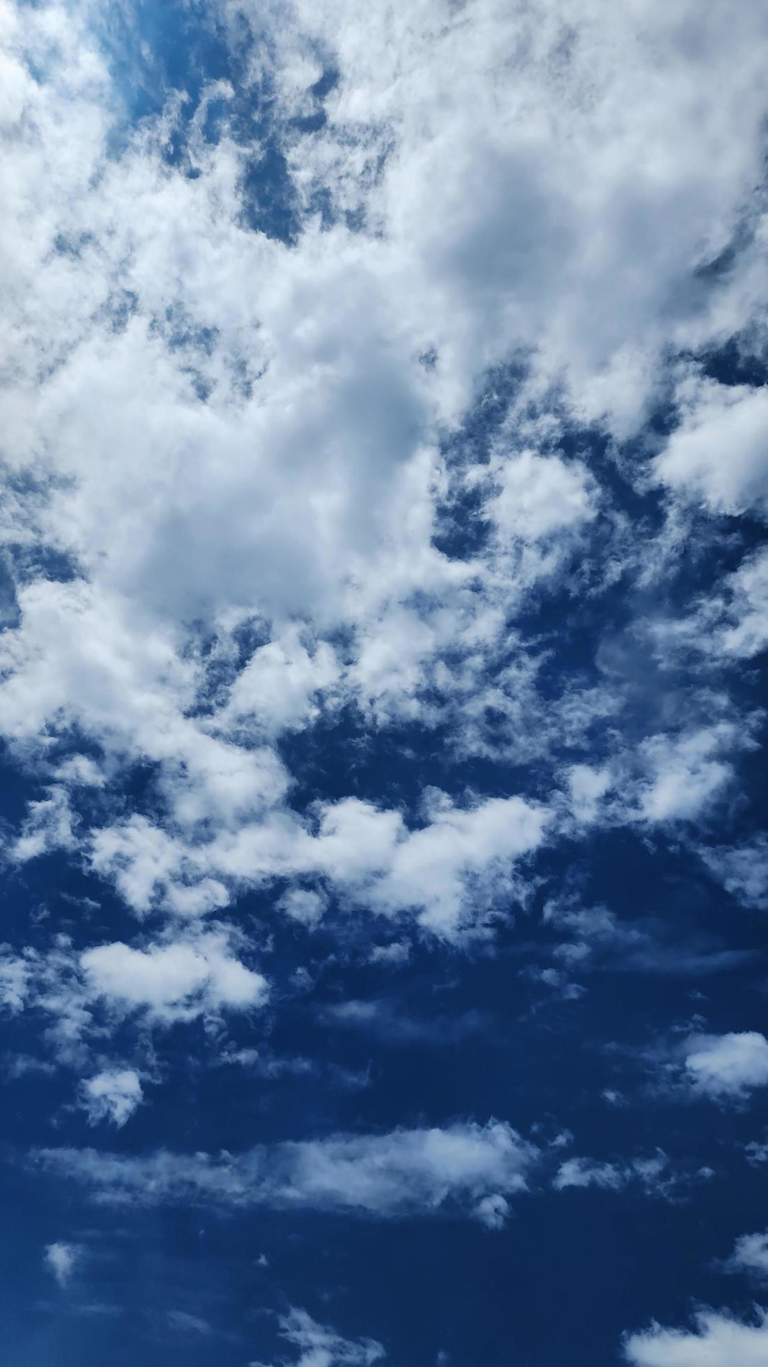 Cumulus Clouds In A Blue Sky During Day Time. Natural Sky Background and Wallpaper Stock Free