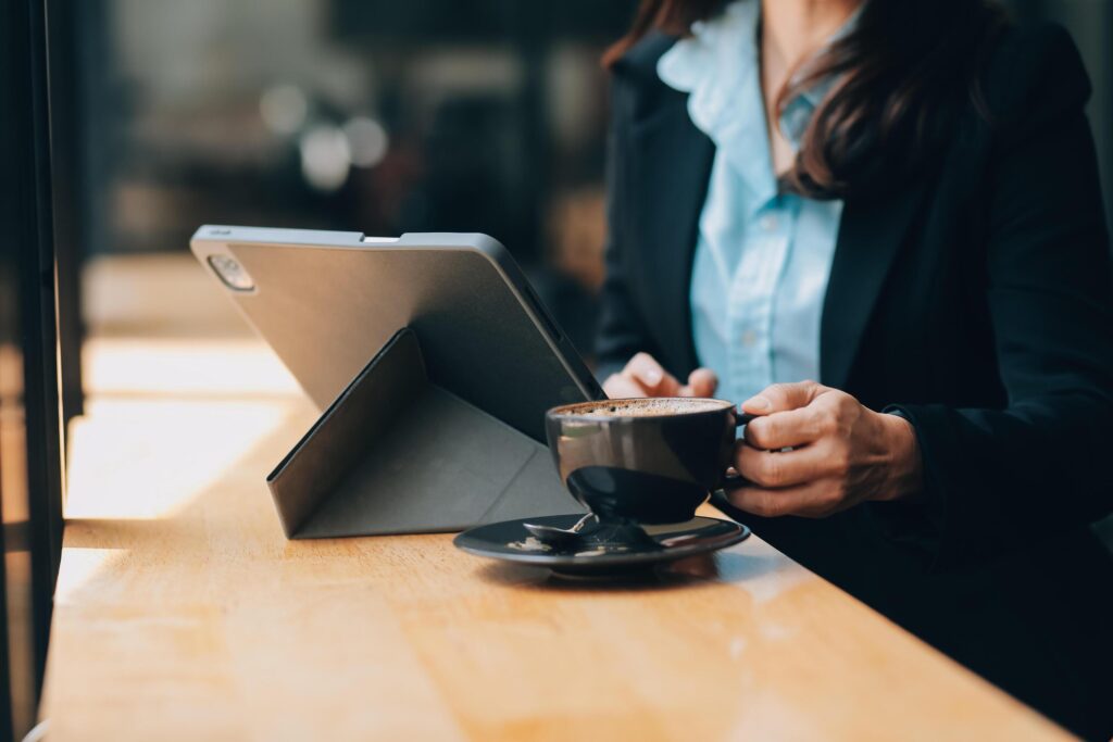 Coffee Cup on the Table with Computer Keyboard for Business Concept. Stock Free