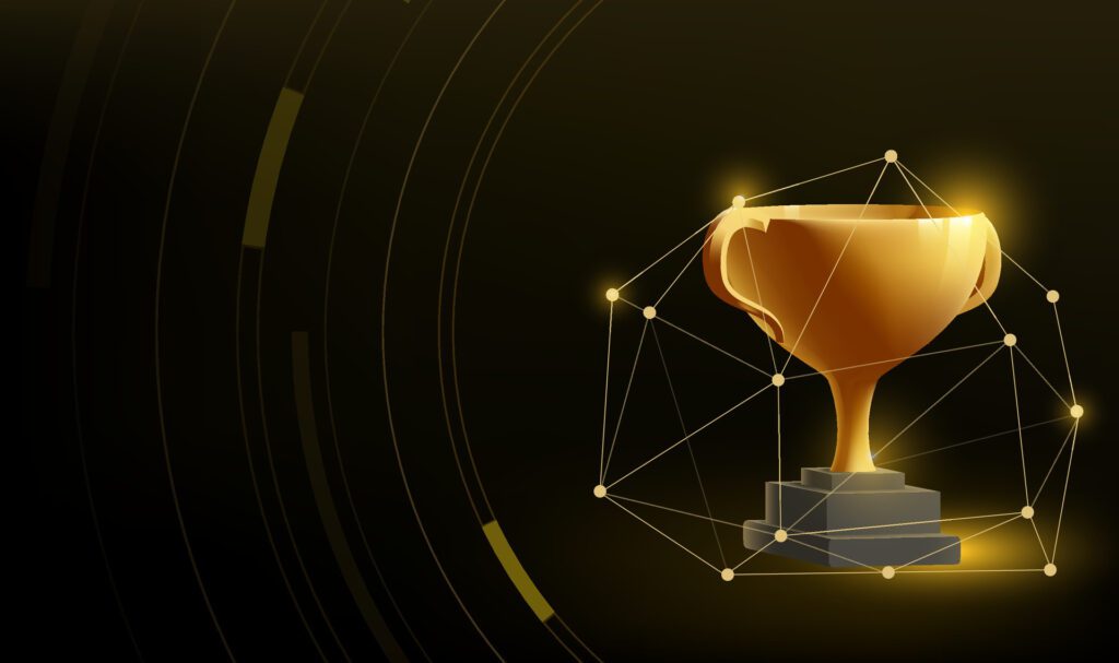 A gold trophy stands on a platform against a black background Free Vector