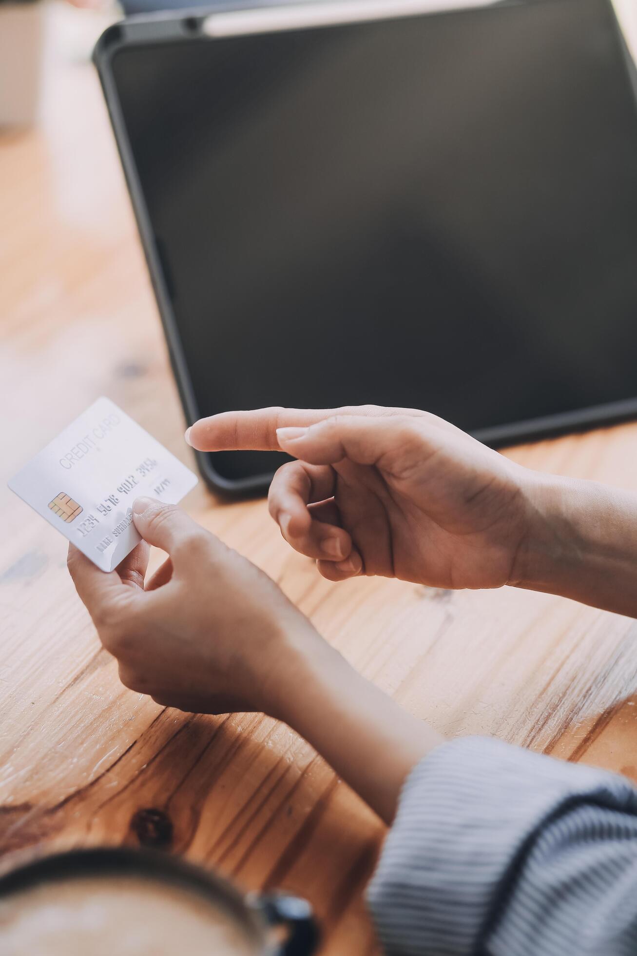 Happy asian woman using smartphone shopping online with credit card. Lifestyle. Easy pay using smart phone or digital device. Stock Free