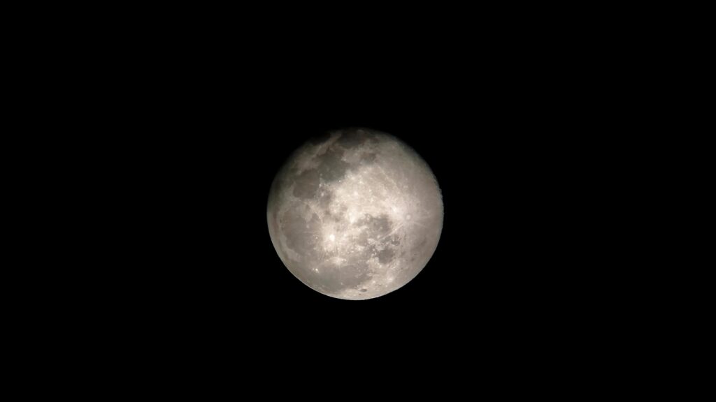 Super full moon with dark background. Madrid, Spain, Europe. Horizontal Photography. Stock Free