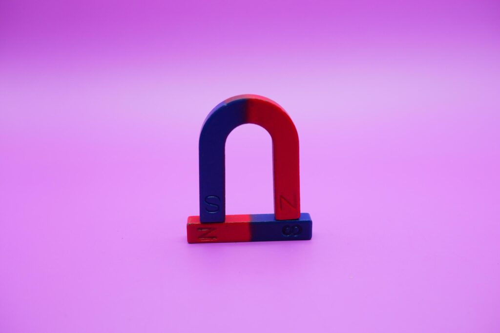 horseshoe magnets and bar magnets isolated on a purple background Stock Free