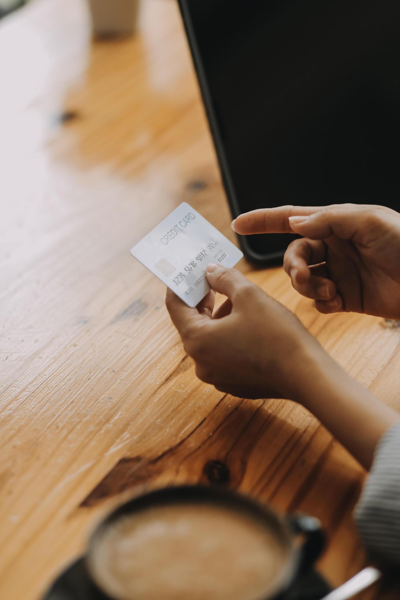 Happy asian woman using smartphone shopping online with credit card. Lifestyle. Easy pay using smart phone or digital device. Stock Free