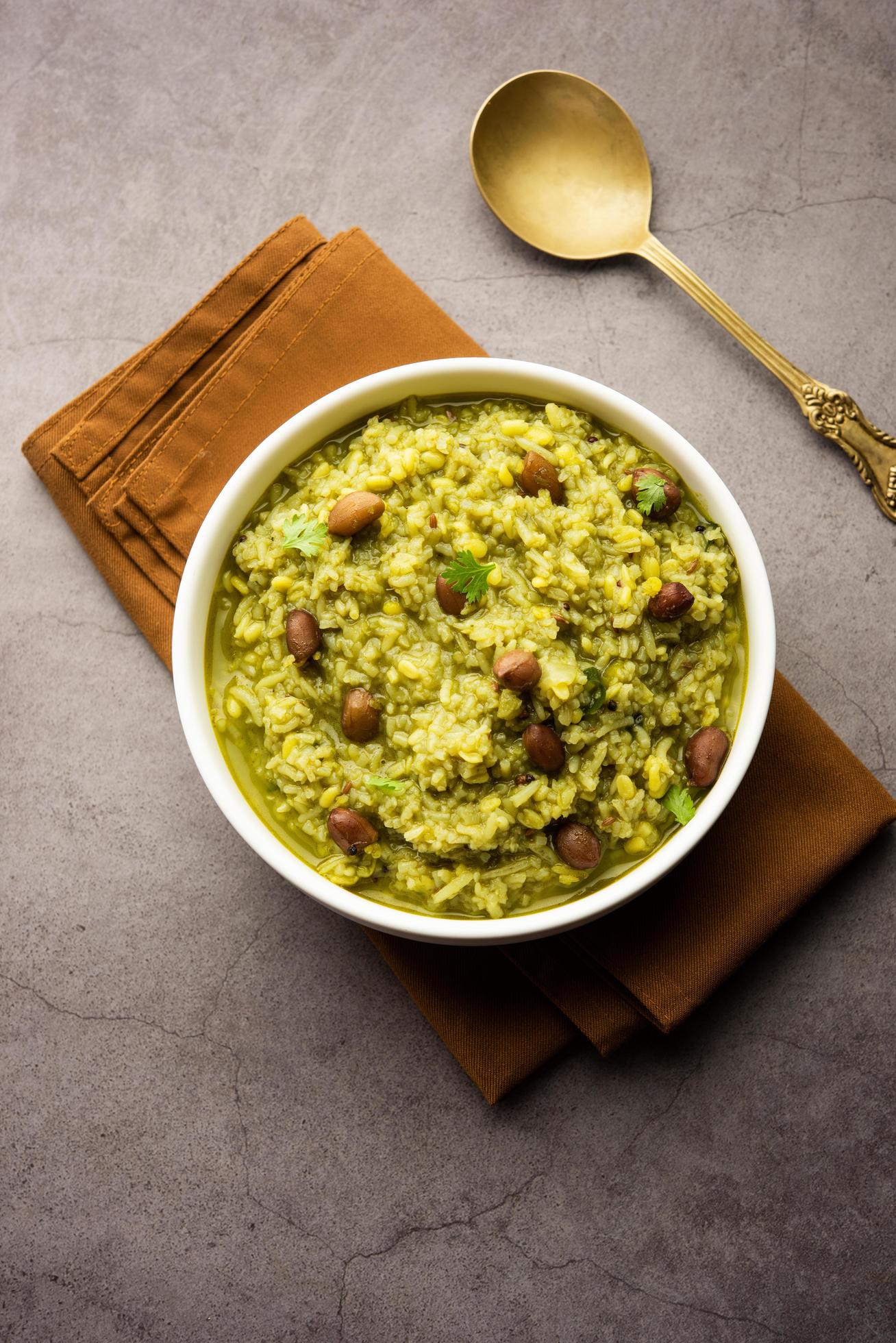 Palak khichdi is a one pot nutritious meal of mung lentils and rice with spinach, Indian food Stock Free