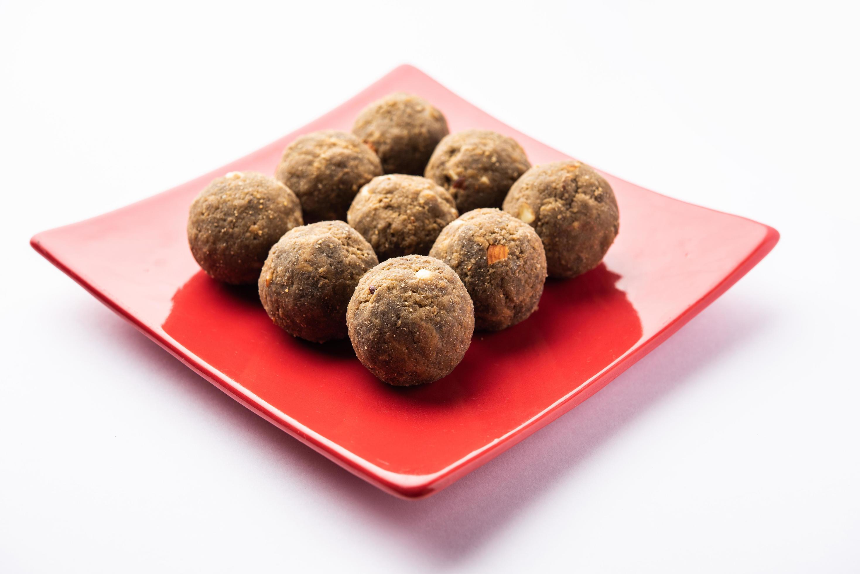 Bajra Atta Ladoo or kuler laddoo – Millet Flour Laddu, a popular winter sweet snack food from India Stock Free