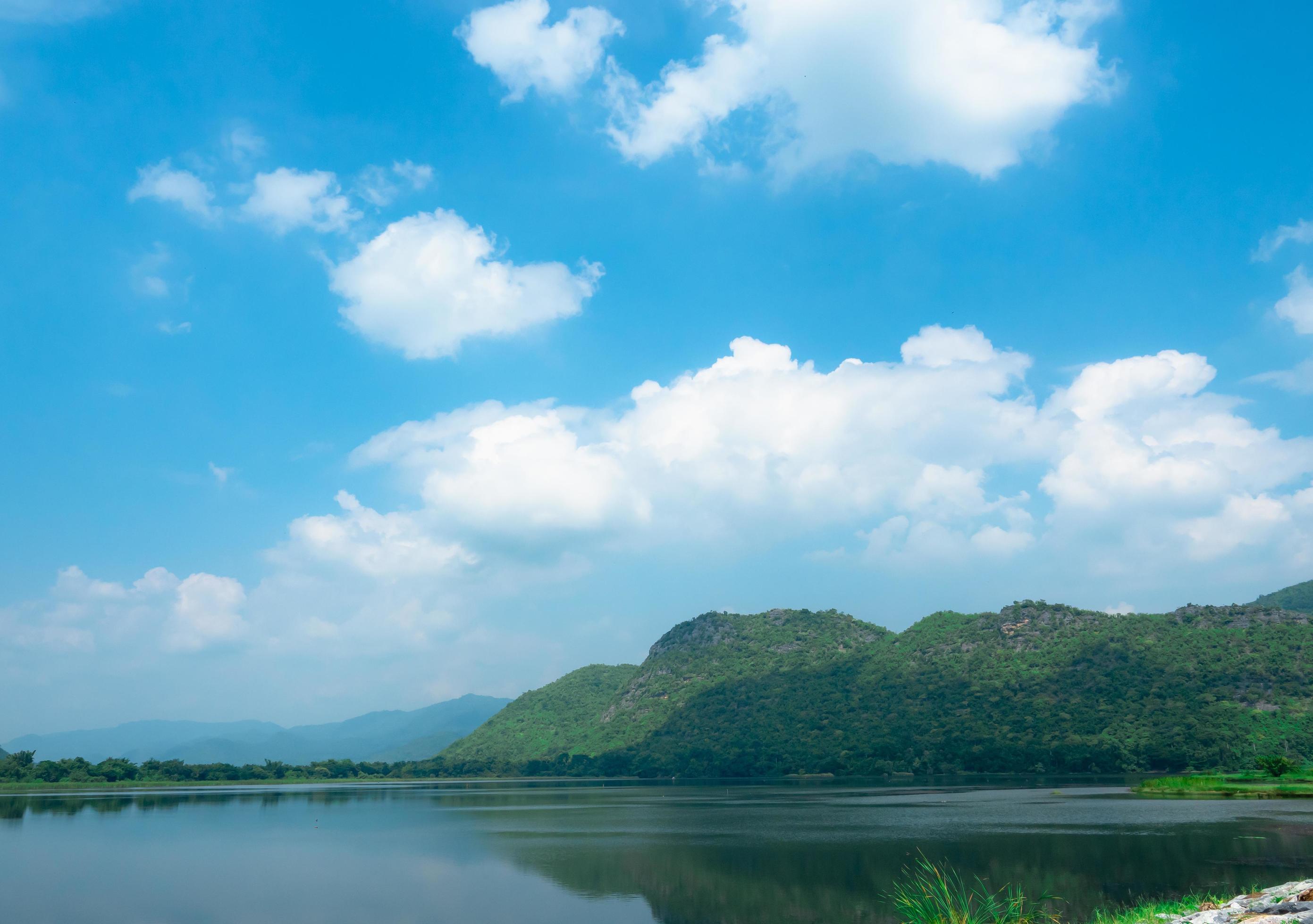 Valley and lake beautiful view landscape with the blue sky and white cloudy,Forest and mountain with river in natural Stock Free