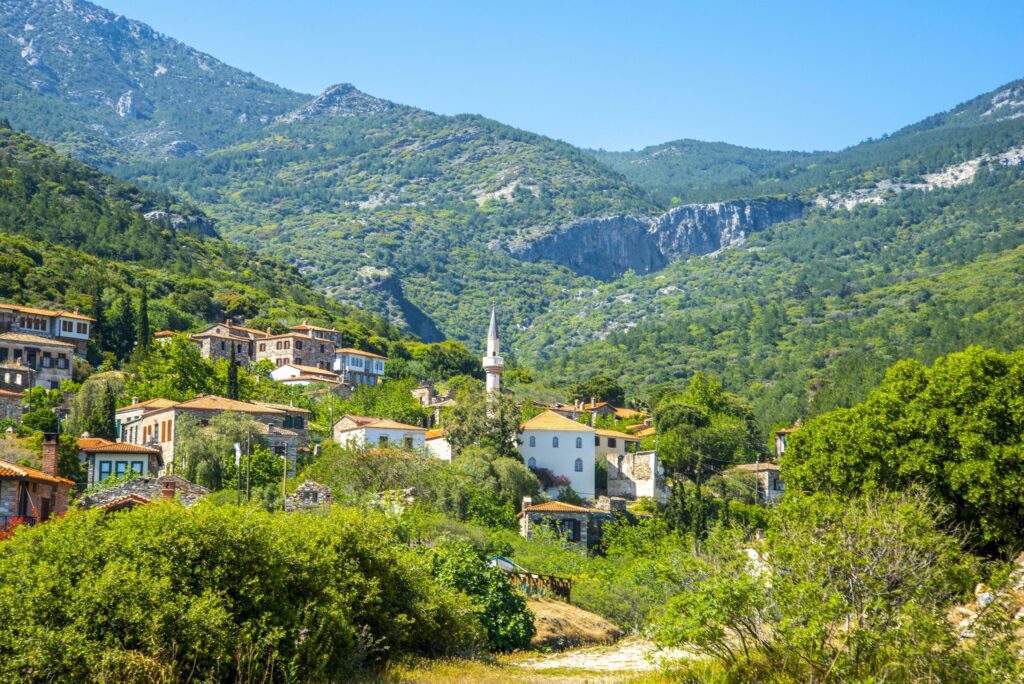 The landscape of Doganbay village and stone house on a summer and sunny day. Stock Free