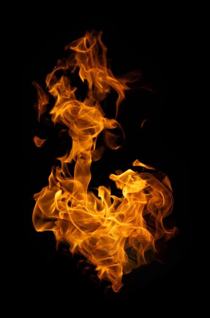 Fire and burning flame of explosive fireball isolated on dark background for abstract graphic design concept Stock Free