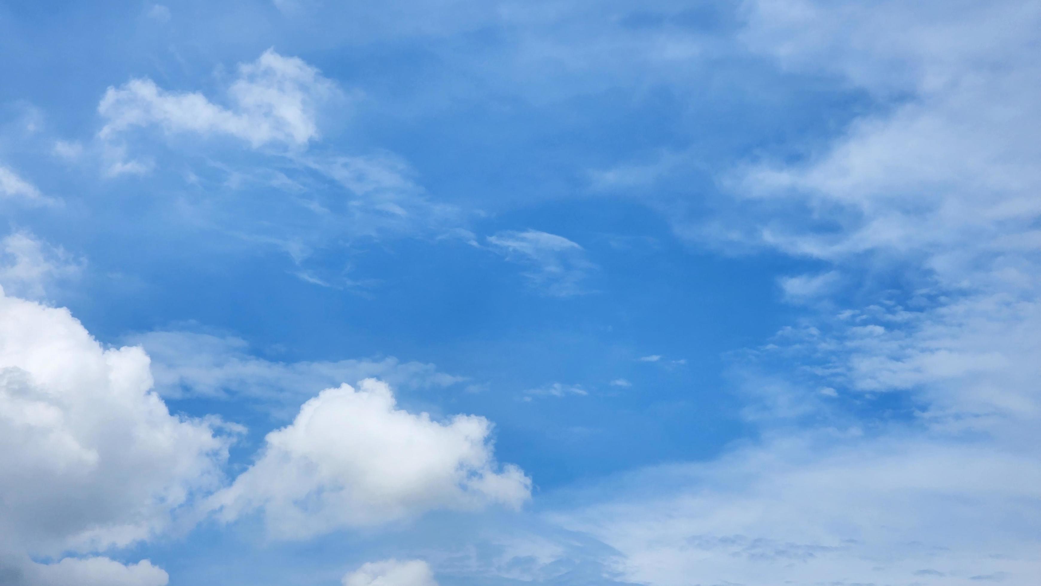 Cumulus Clouds In A Blue Sky During Day Time. Natural Sky Background and Wallpaper Stock Free