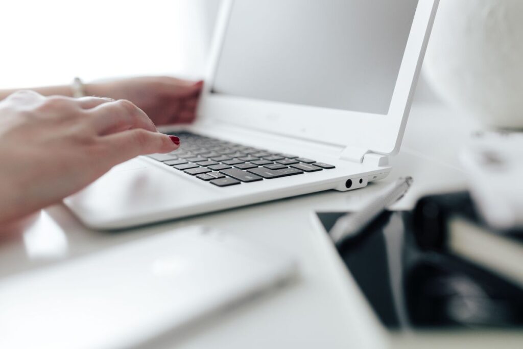 Workplace with laptop on table at home Stock Free