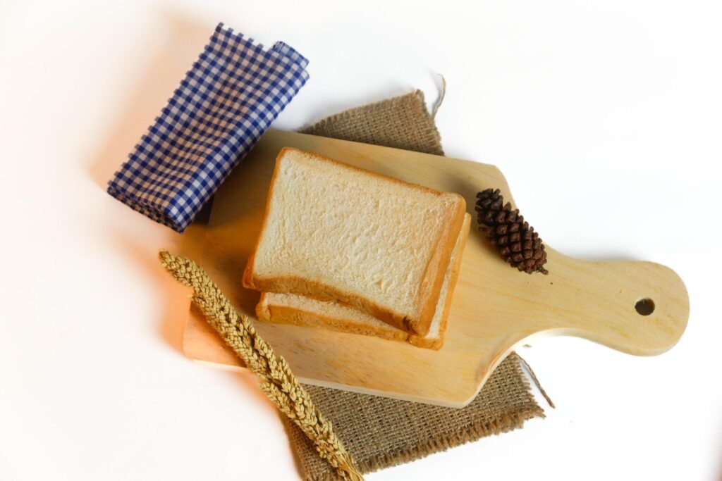 photography of bread with wheat on a white background Stock Free