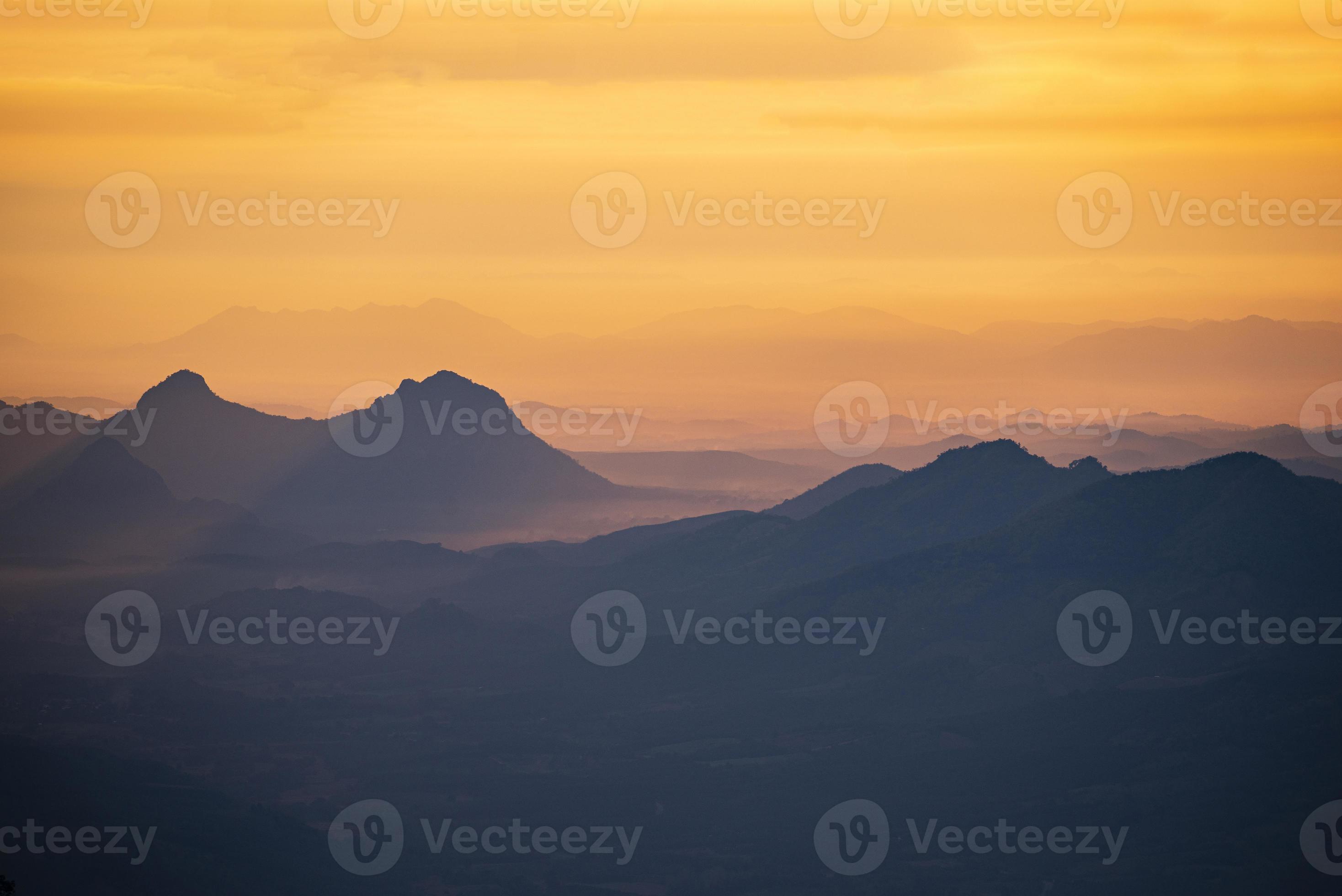 Landscape sunrise or sunset on the mountain beautiful sky yellow orange, Mountain valley during sunrise natural summer landscape Stock Free