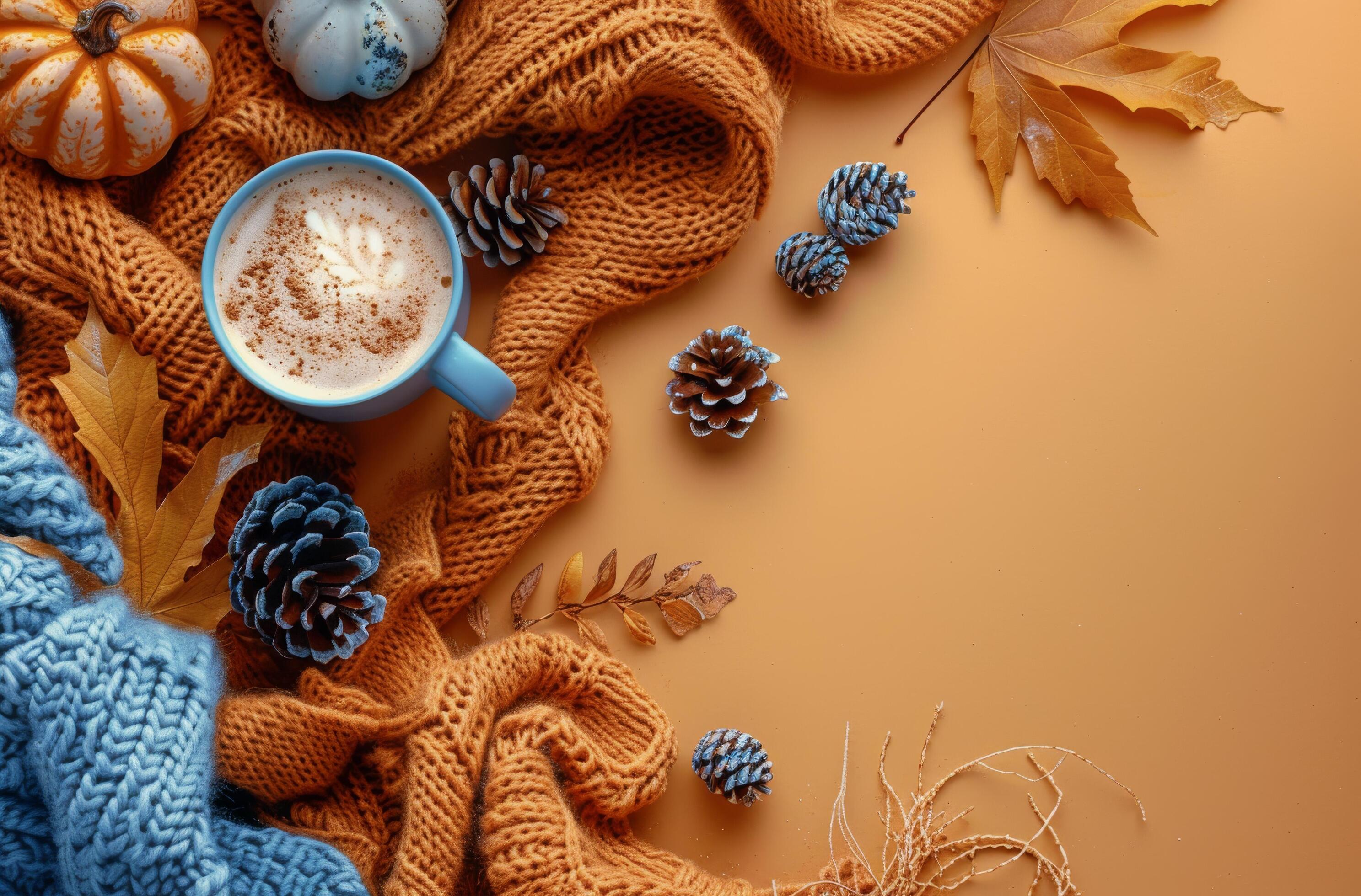 Cozy Autumn Scene With Knitted Scarves, Pumpkins, And A Cup Of Coffee Stock Free