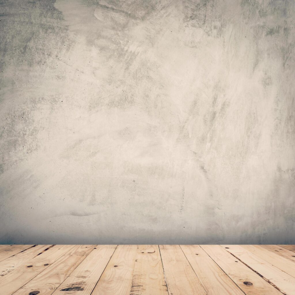 empty cement wall and wood floor background with space Stock Free