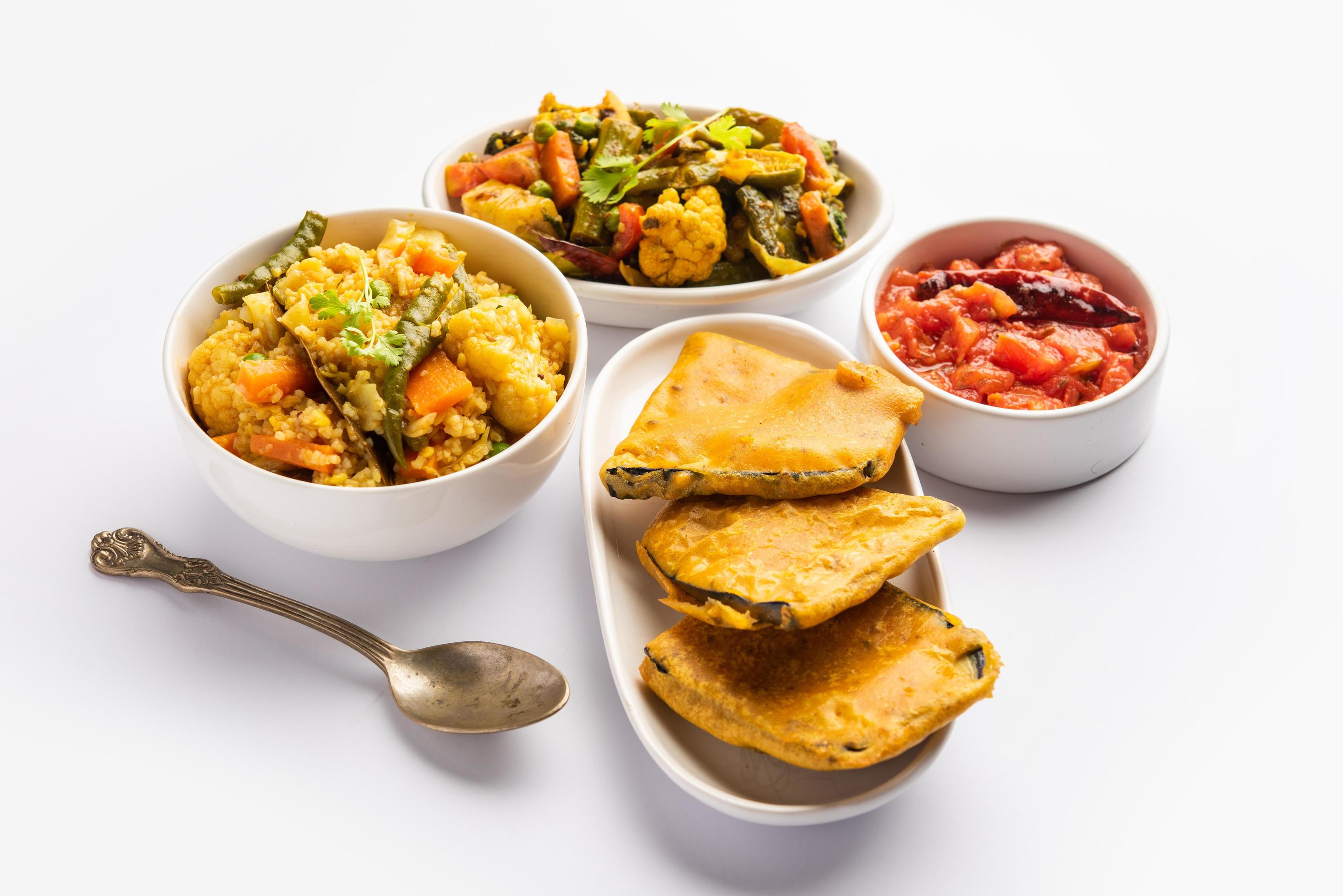 Bengali Bhog food for Indian Hindu Durga Puja or pooja festival. Khichadi, labra, tomato chutney Stock Free