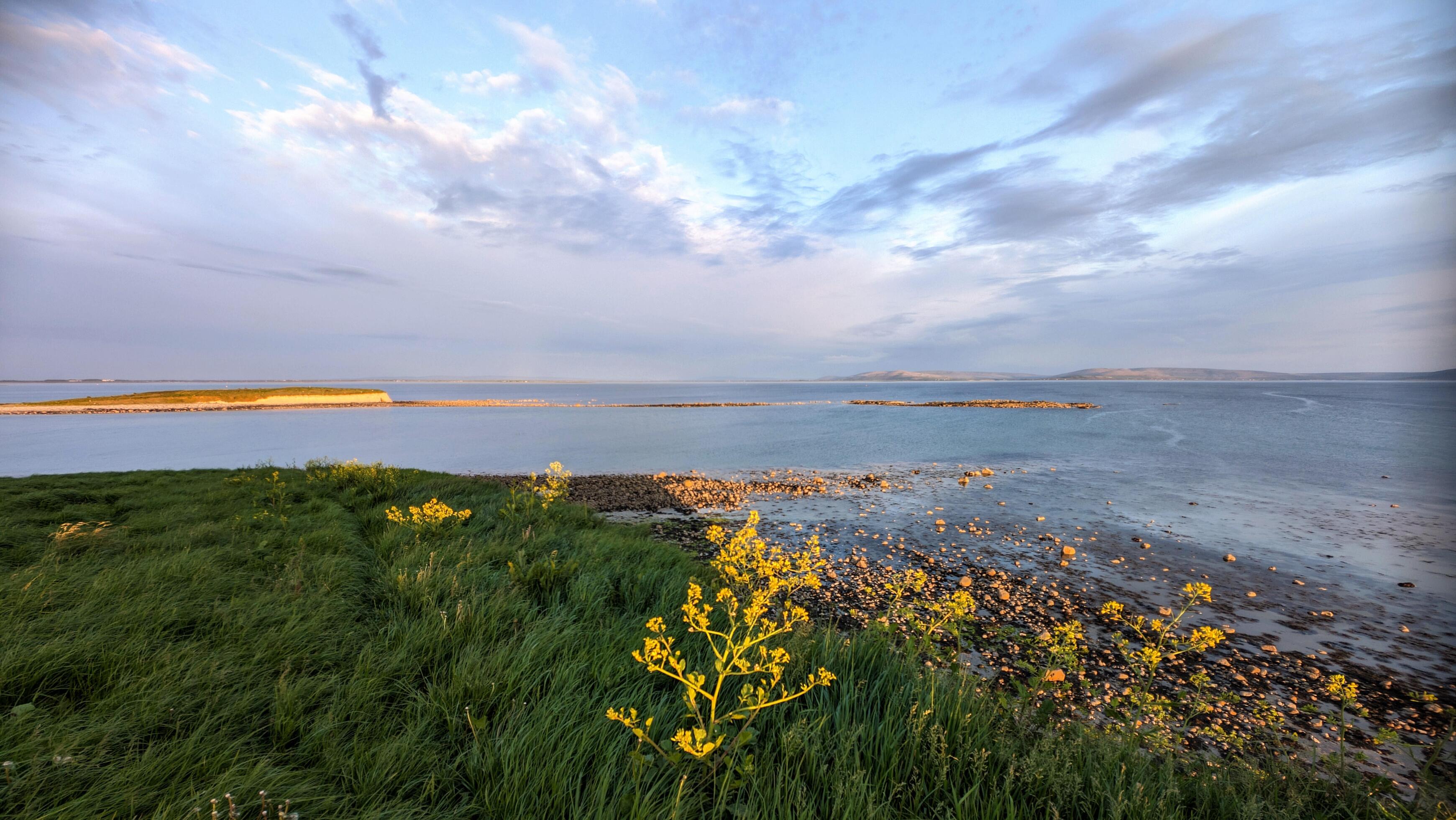 Beautiful coastal sunset landscape scenery of wild Atlantic way at Silverstrand beach, Galway, Ireland, nature background, wallpaper Stock Free