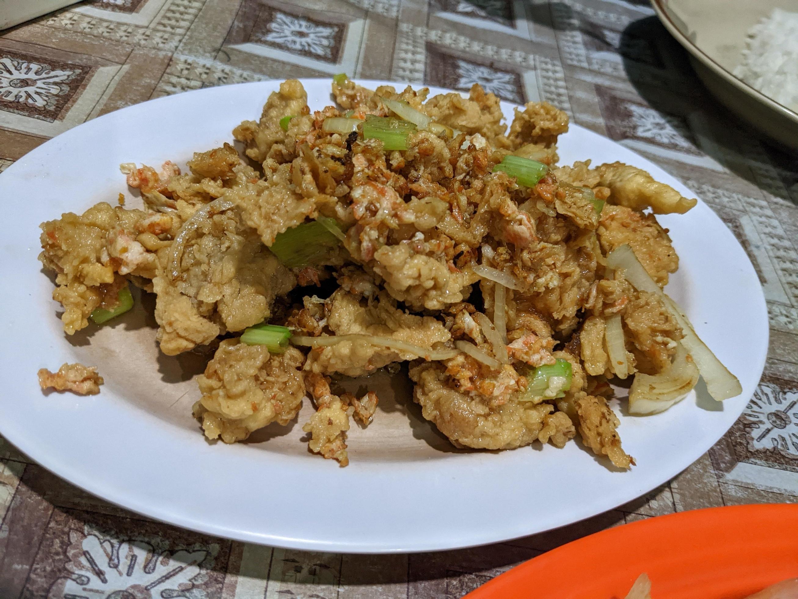 Chicken salted eggs crispy traditional food of Semarang. The photo is suitable to use for traditional food background, poster and food content. Stock Free