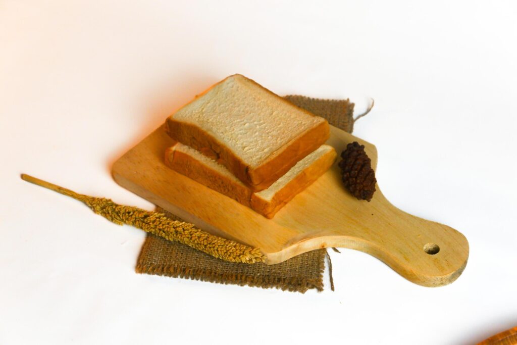 photography of bread with wheat on a white background Stock Free