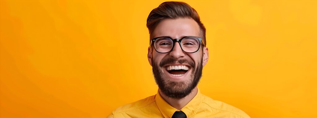 Confident Young Business Professional Smiling Against Orange Background Stock Free