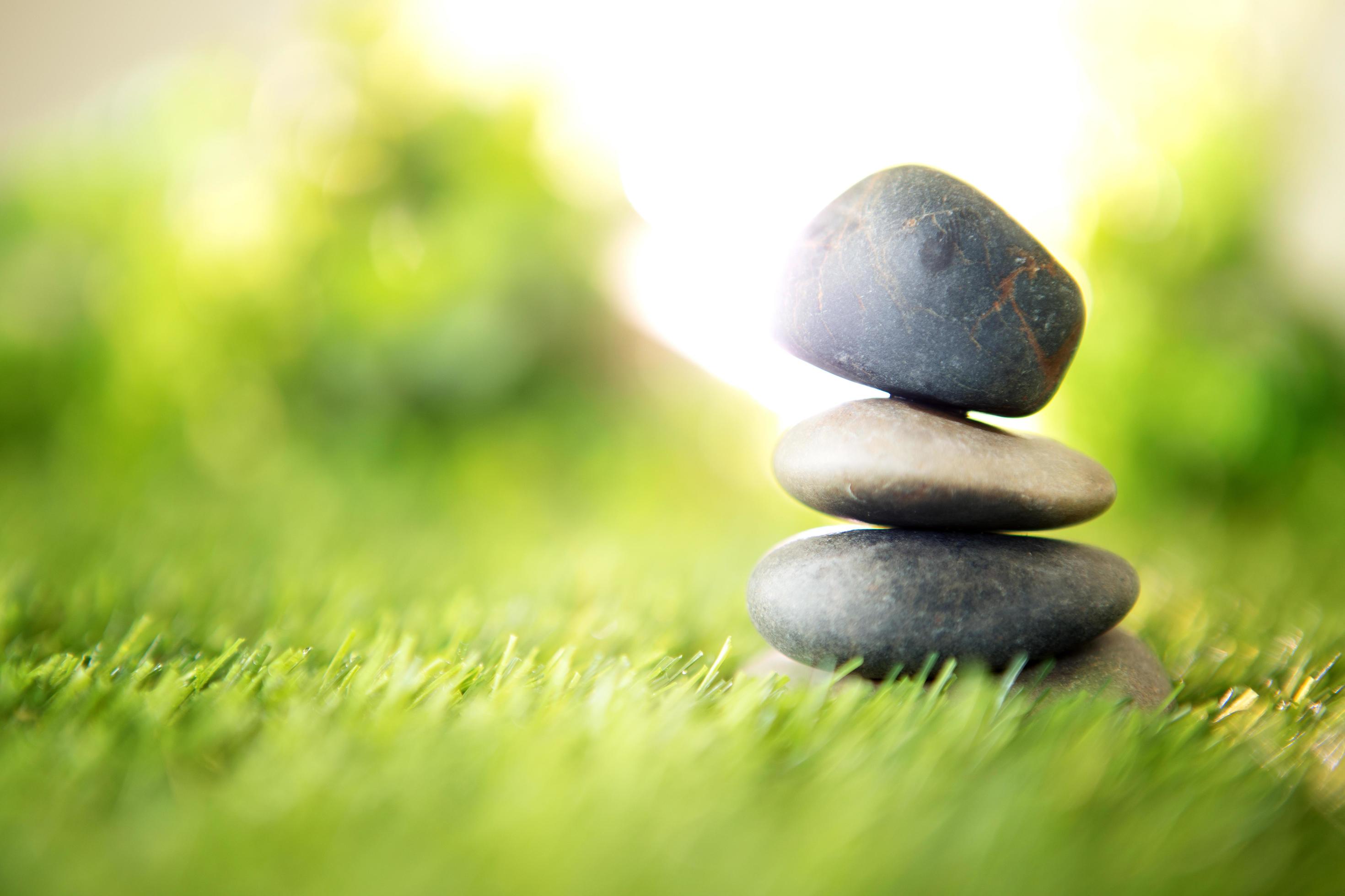 Stone pyramid on grass Stock Free