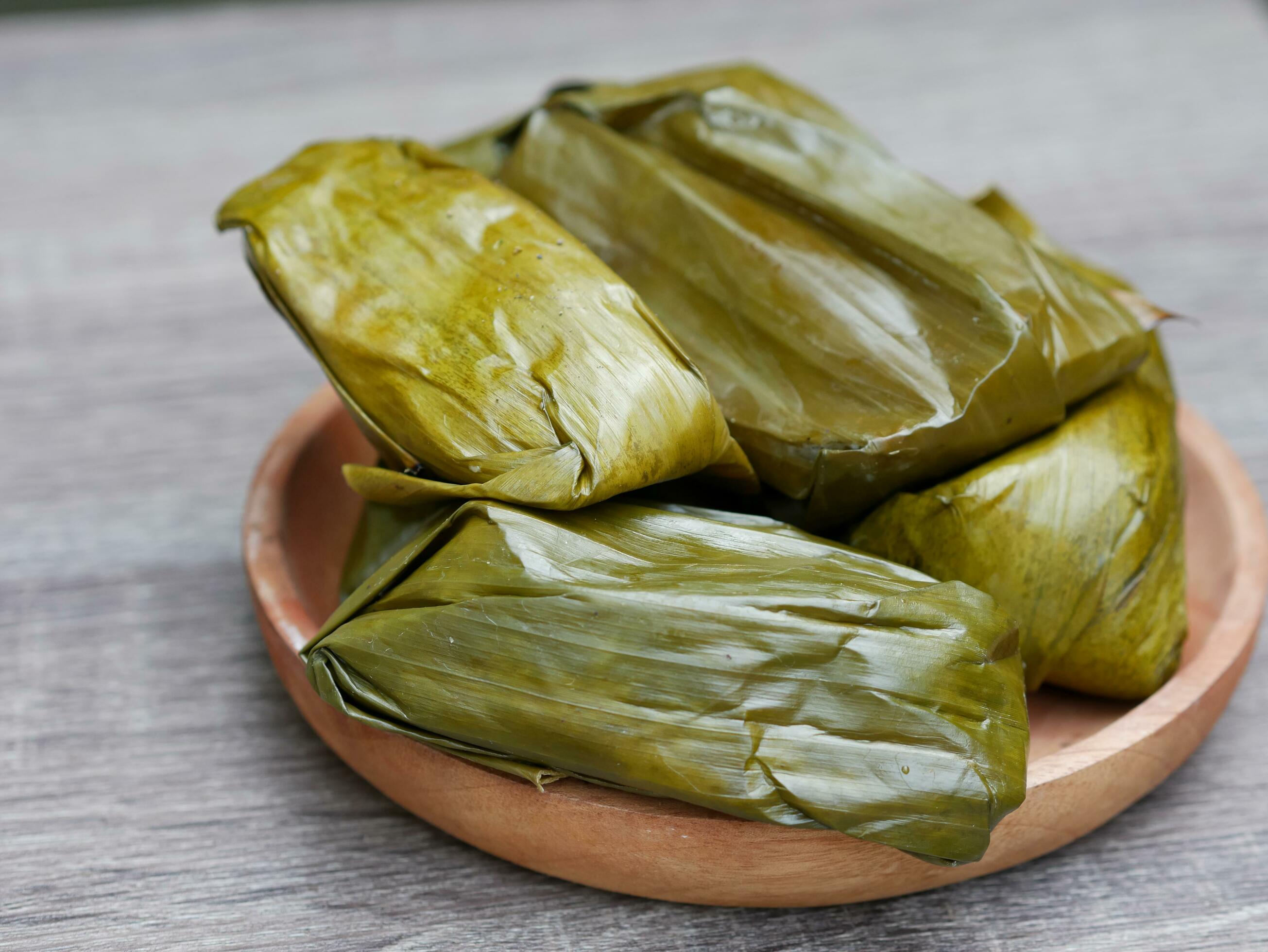 Buras or rice processed food filled with chopped chicken meat. Indonesian traditional food Stock Free