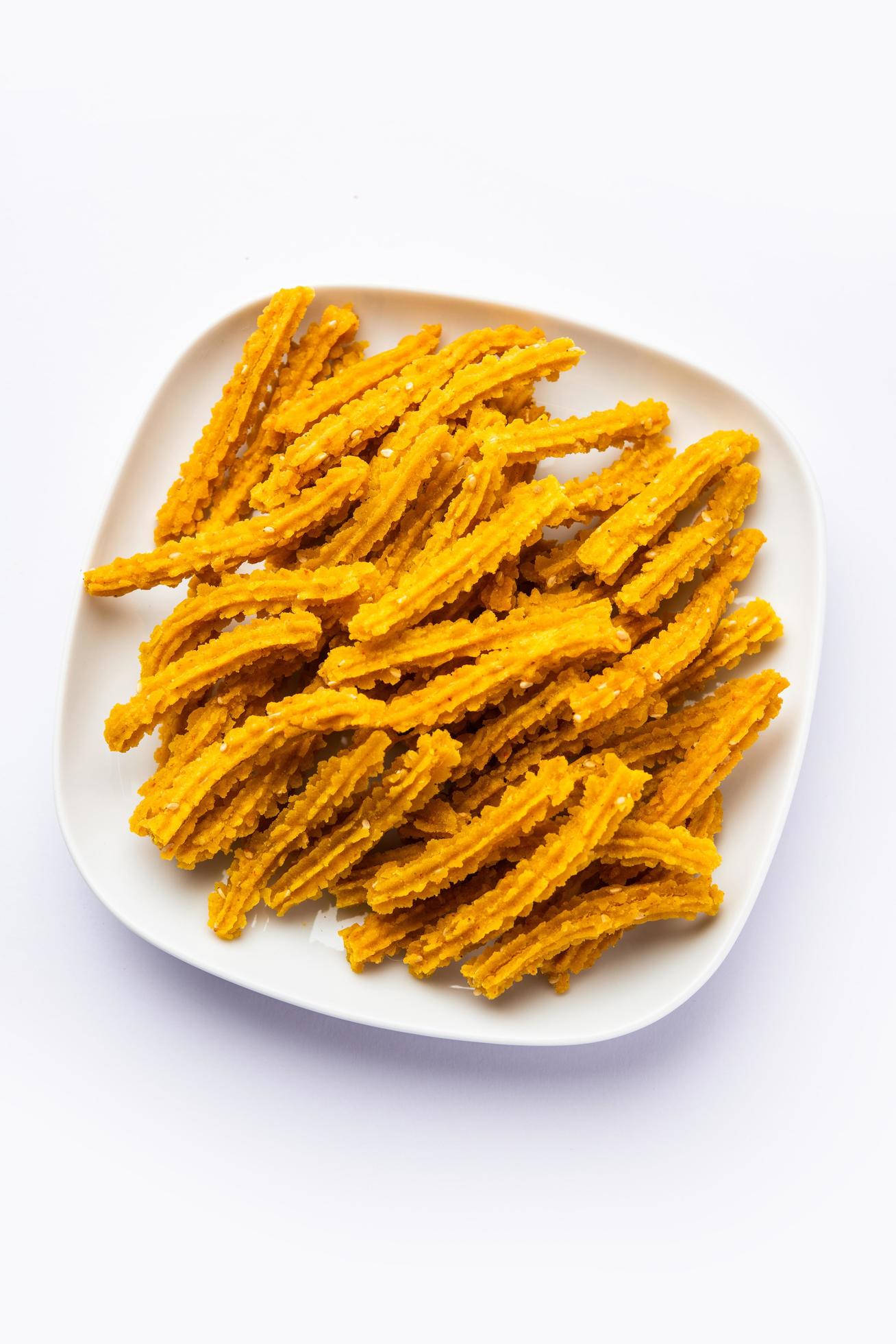 Bhajni chakli sticks or crunchy murukku snack made using diwali festival, favourite munching food Stock Free