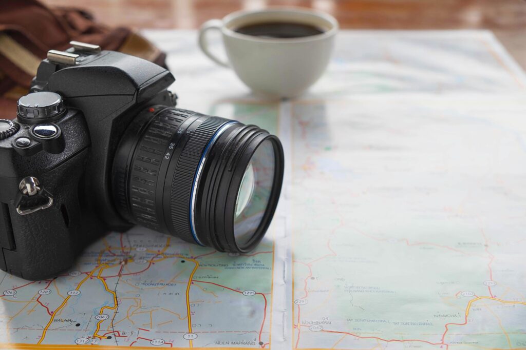 Close-up of a camera on a map Stock Free