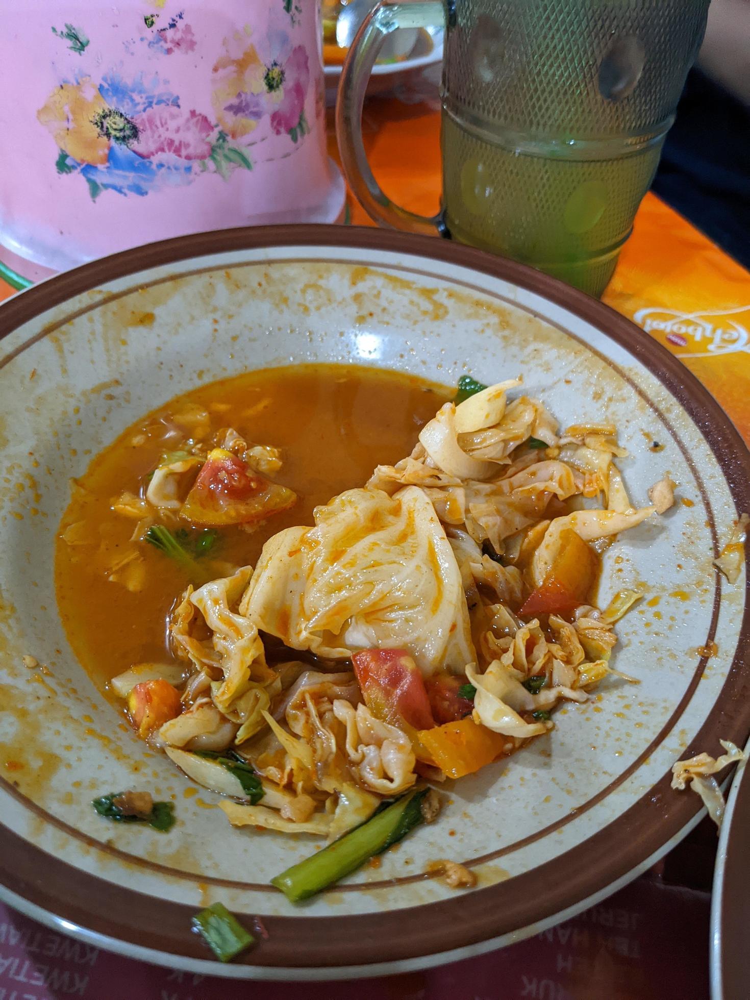 Plate and bowl after finish dinner on the traditional restaurant. The photo is suitable to use for food background, poster and food content media. Stock Free