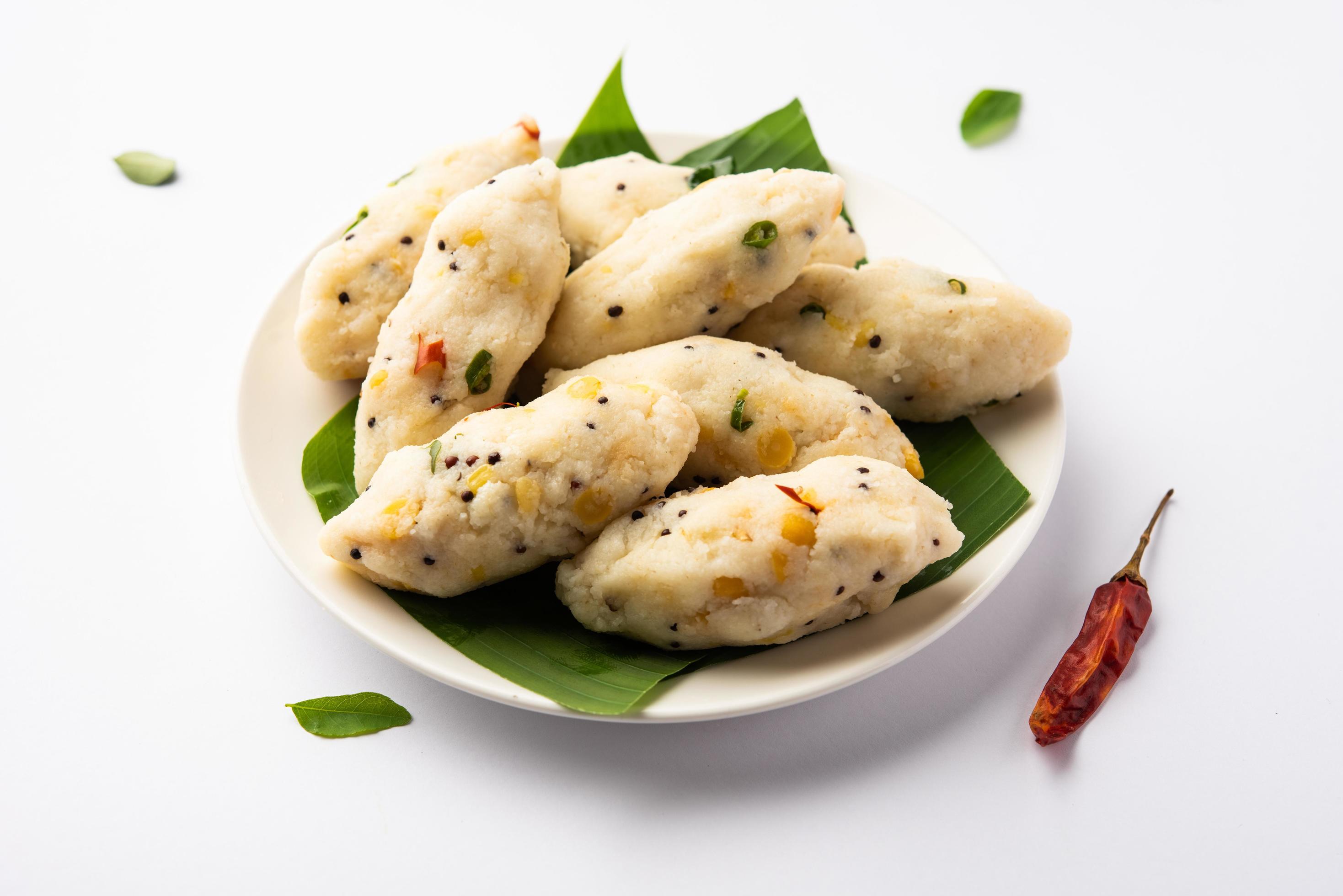 Kozhukatta Pidi is a steamed snack food from kerala rice flour with finger impressions Stock Free