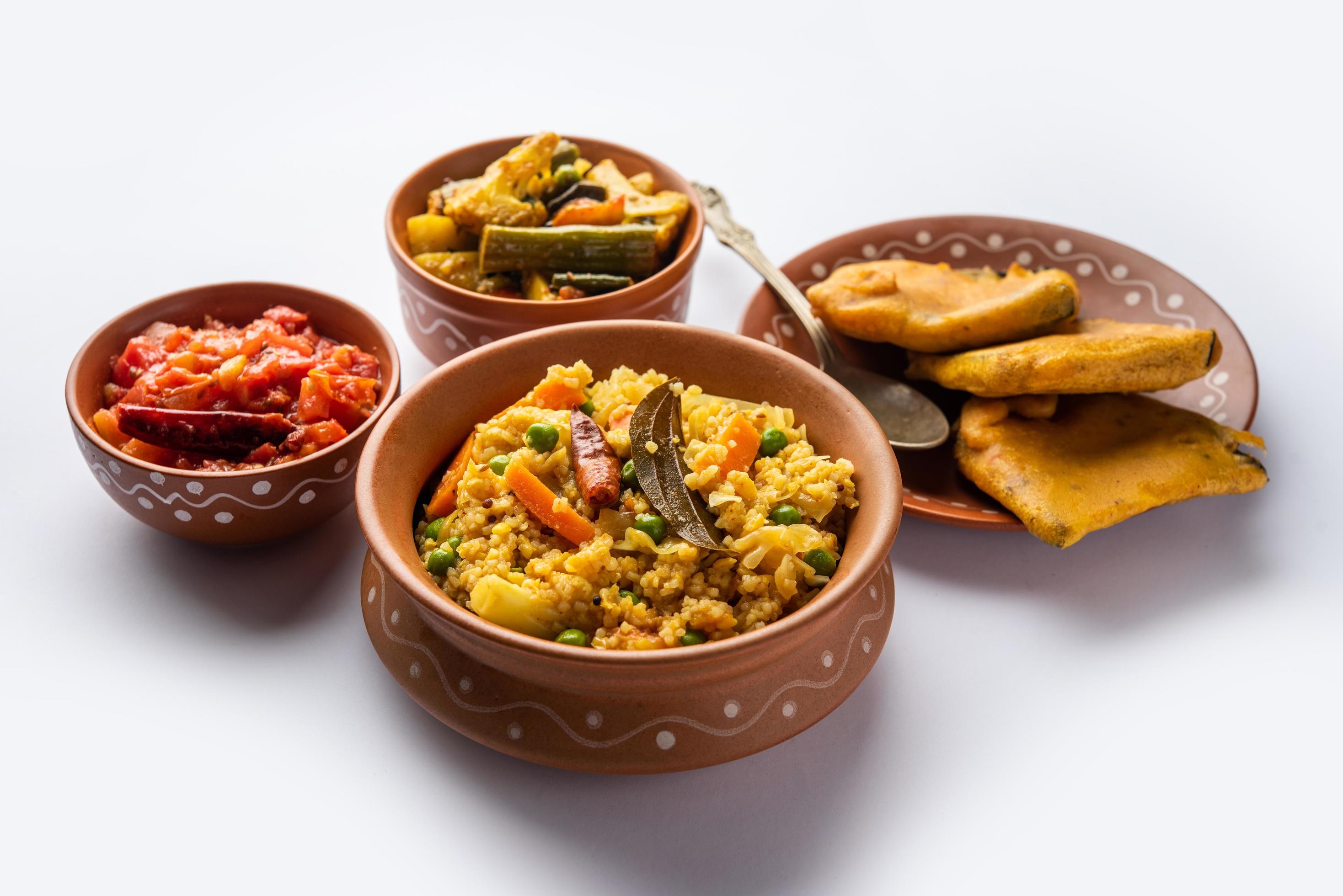 Bengali Bhog food for Indian Hindu Durga Puja or pooja festival. Khichadi, labra, tomato chutney Stock Free