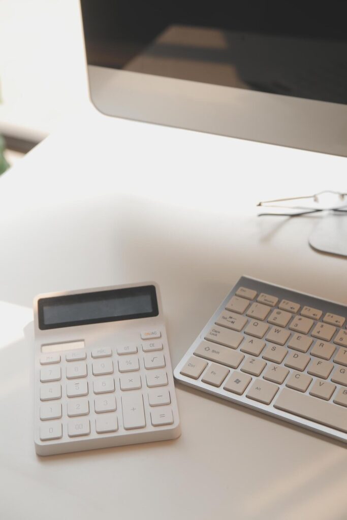 messy office workspace. Messy and cluttered office desk. Messy business office with piles of files and disorganized clutter. Stock Free