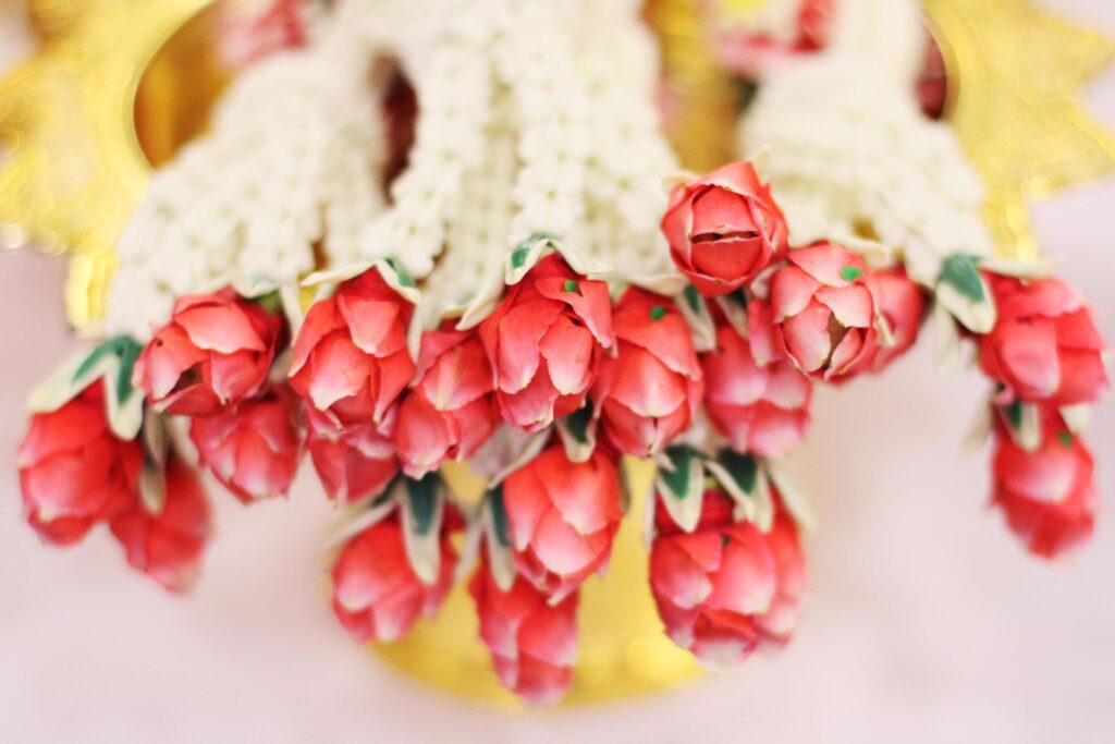 Flower garlands on a gold tray in tradition Thai wedding ceremony day. Jasmine garland Stock Free