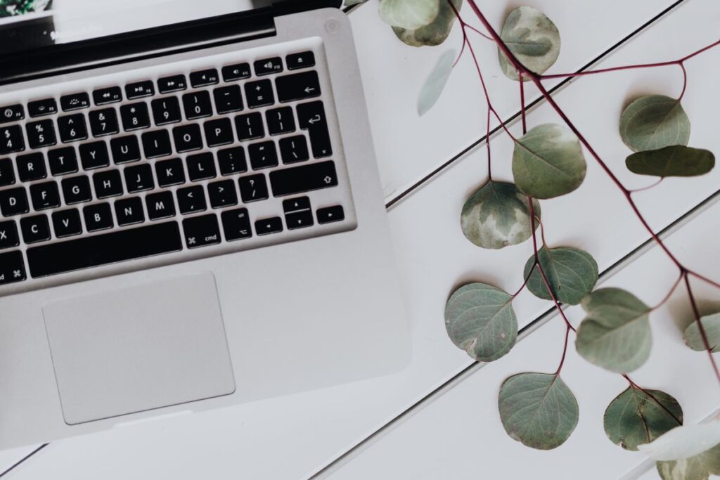 Apple MacBook & Coffee on the white desk Stock Free