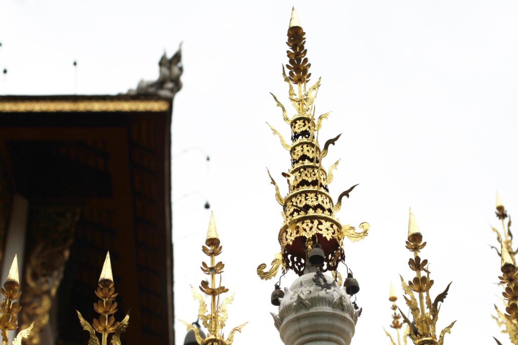 Golden pagoda and naga in temple of Thailand Stock Free