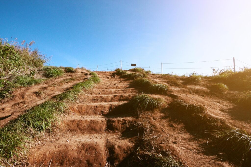 Natural Steps on the ground in forest leading up to the top of hill and on valley mountain in Thailand. Successful concept. Stock Free