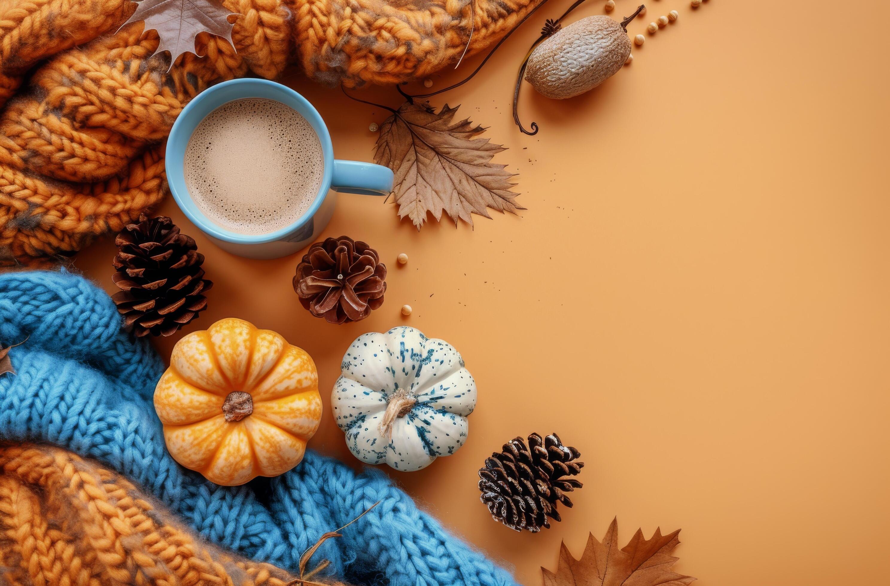 Cozy Autumn Scene With Knitted Scarves, Pumpkins, And A Cup Of Coffee Stock Free