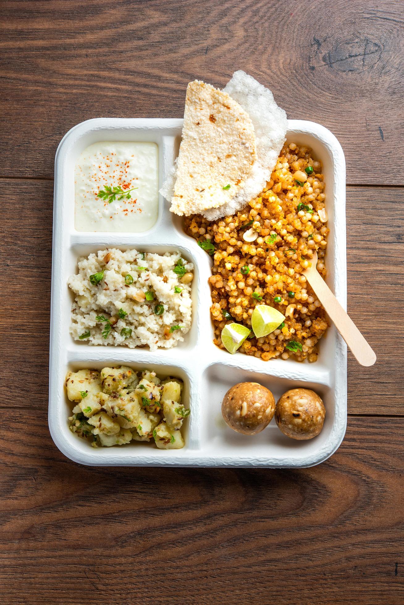 Indian Upwas thali, fasting food platter or thali for home delivery or takeaway parcel for any Vrat Stock Free